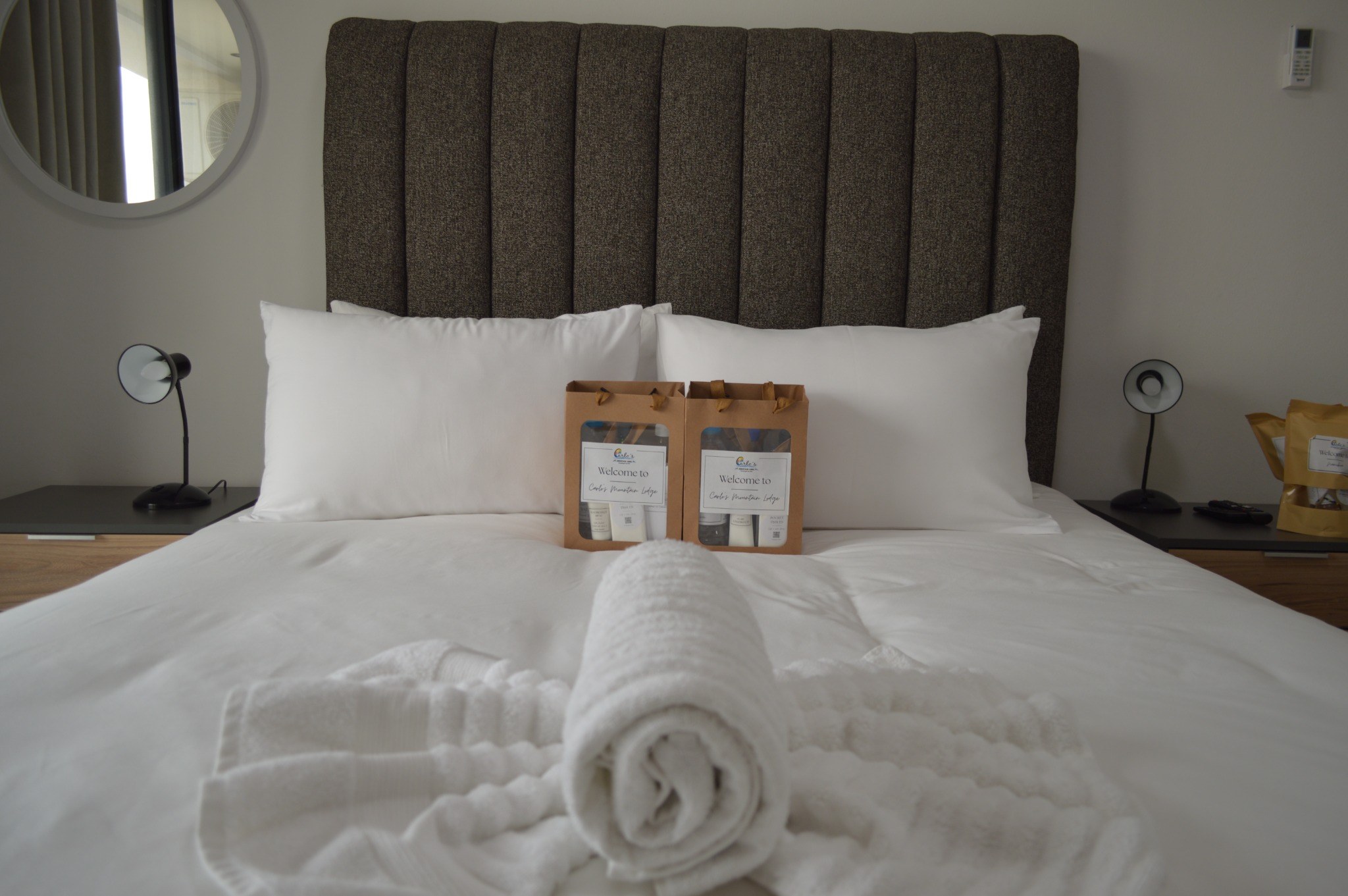 A welcoming guest room with crisp white bedding