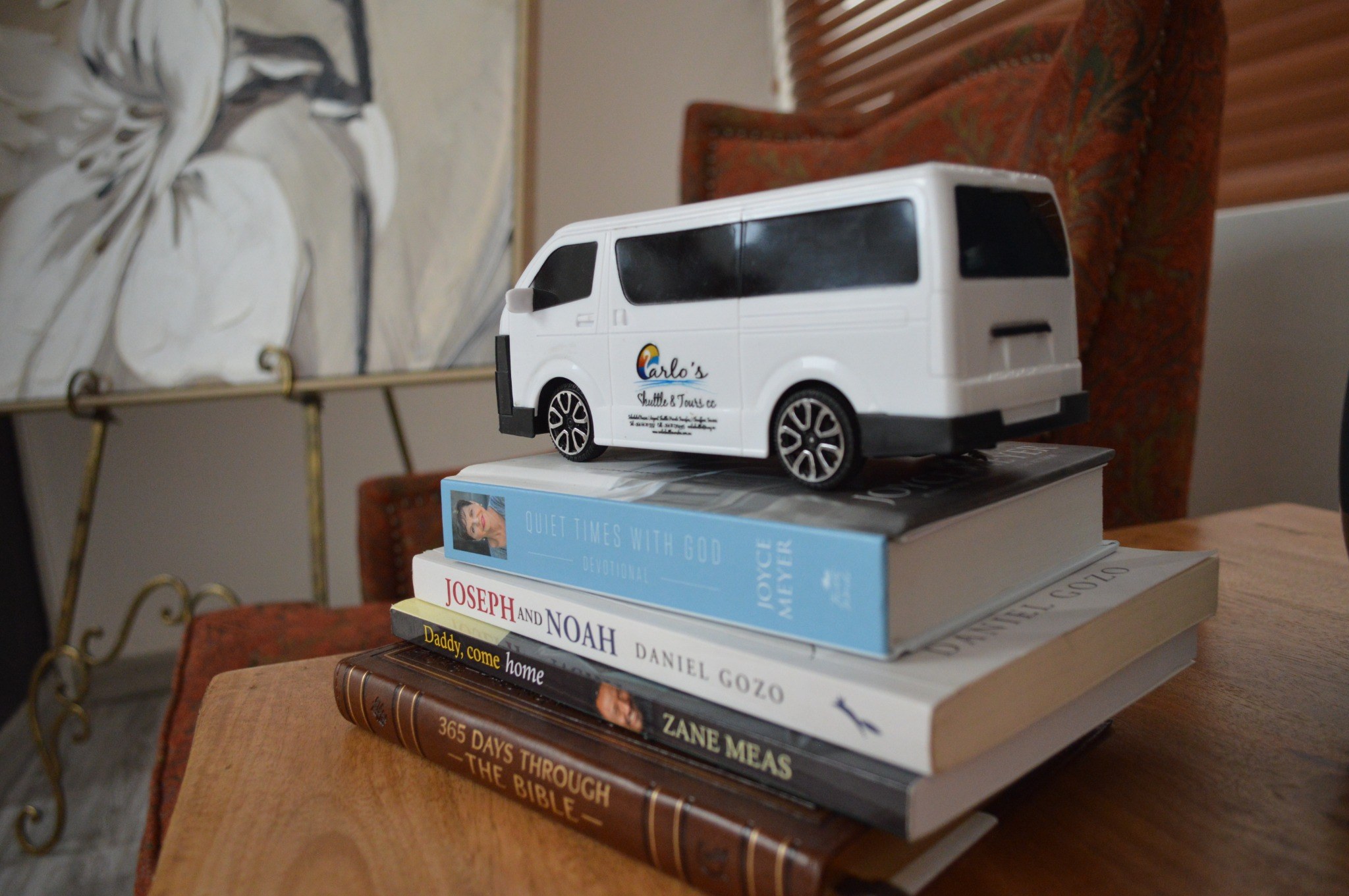Carlo’s branded miniature shuttle and books